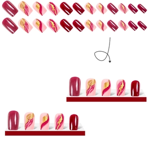 Press-on nails set with burgundy marble texture, gold foil accents, and square shape