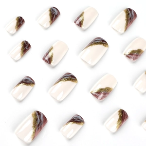 French medium square press-on nails with marble ink swirl and gold glitter accents