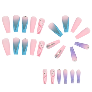 Matte rainbow gradient press-on nails with camellia flowers and rhinestones
