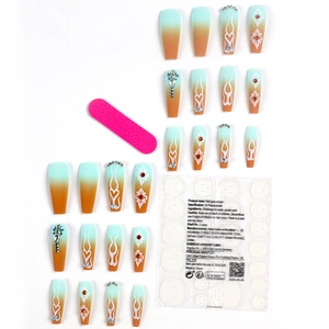 Long brown gradient press-on nails with camellia flowers and rhinestone accents