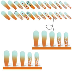 Blue and orange gradient long coffin press-on nails with white flowers and rhinestones