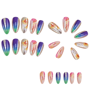 Glitter almond press-on nails with floral patterns and gradient sequin art designs