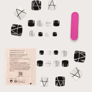 Set of 24 press-on toenails in black, white, and silver glitter with geometric patterns