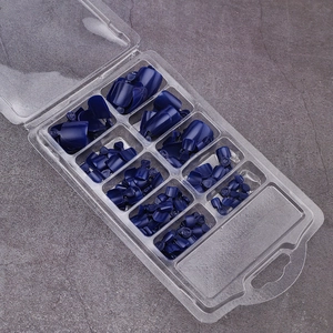 Deep blue press-on toenail kit with multiple sizes in a transparent storage box