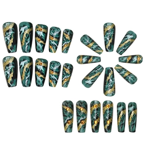 Press-on nails in long coffin shape with green marble design, gold glitter and rhinestones