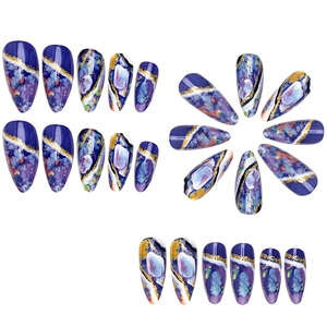 Starry sky marble almond fake nails with gold foil and deep blue purple glitter design
