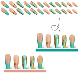 Detailed view of long coffin press-on nails with green marble design and gold foil accents