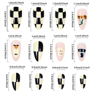 Size chart for Halloween press-on nails with checkerboard and ghost patterns