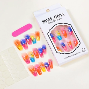 Detailed set of gradient floral press-on nails with rhinestones, nail file, and glue tabs