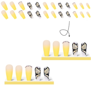 Long coffin press-on nails with yellow ombre gradient, rhinestones and butterfly design