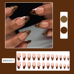 Leopard print almond fake nails with pink floral accents set in medium length