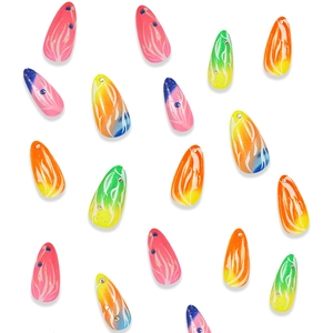 Almond press-on nails with colorful gradients, white flame patterns and rhinestones