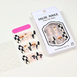 Detailed view of checkered ghost press-on nails set with tools and display box