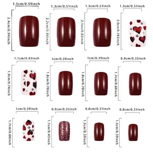 Size chart for burgundy heart press-on nails featuring 12 different detailed dimensions