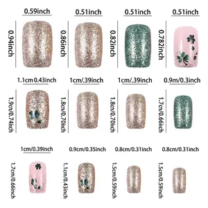 Size chart for Saint Patrick clover press-on nails with 12 dimensions in cm and inches