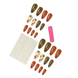Autumn almond press-on nails set with maple leaf design and orange brown color palette