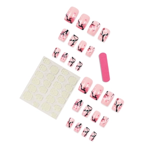 Pink gradient press-on nails with cherry blossom patterns and complete application kit