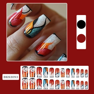 Sparkly medium-long square press-on nails with red and black flame butterfly wing patterns