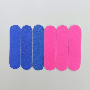 Detail view of 6-piece double-sided nail files in blue and pink for manicure shaping