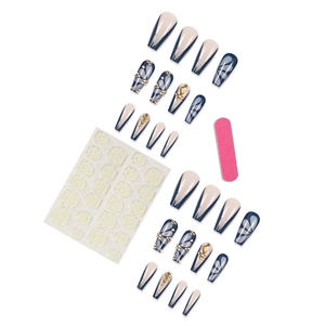 Blue and beige coffin fake nails with butterfly charms, glitter, and nail art tools