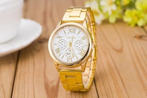 Detailed macro view of Geneva gold steel men's watch with Roman numerals on wood background