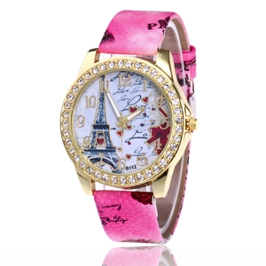 Close-up of pink printed leather strap and Eiffel Tower dial with rhinestones