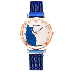 Detail of rose gold cat pattern watch dial with magnetic blue Milanese strap mesh texture