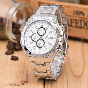 Silver Orlando business watch on wooden surface with coffee beans and tachymeter detail
