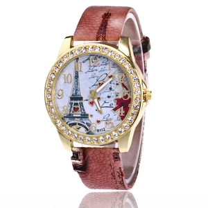 Detailed view of women's quartz watch featuring Eiffel Tower dial and crystal bezel