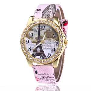Macro view of pink faux leather strap and crystal bezel on Eiffel Tower watch