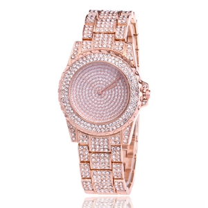 Luxury rose gold women's watch featuring a crystal-encrusted dial and sparkling metal strap