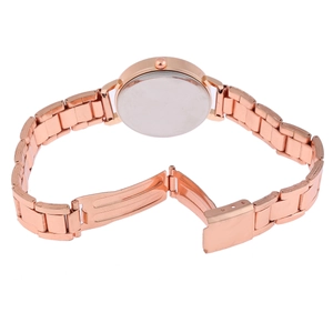 Detail of rose gold metal watch band featuring a secure three-fold safety clasp mechanism