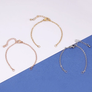 Close-up of 1.8mm stainless steel bolo chains with lobster clasps in gold and silver