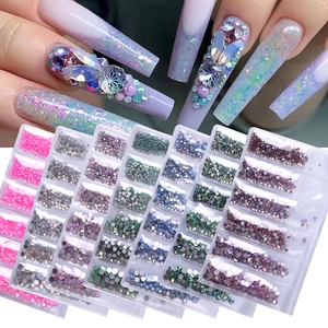 Flatback rhinestones for nail art in multi-grid storage box with hand display