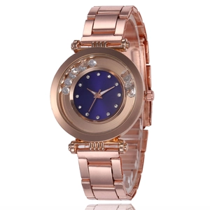 Elegant rose gold steel watch with deep blue dial and sparkling crystal bezel