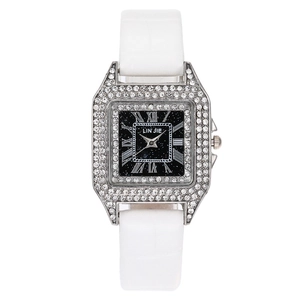 Elegant women's rectangular watch with rhinestone bezel, starry black dial and white leather strap