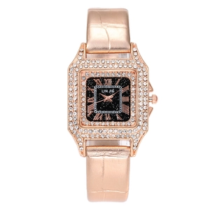 Women's rose gold starry sky quartz watch with roman numerals and rhinestone bezel