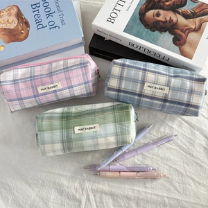 Three minimalist plaid canvas pencil cases in pink, blue, and green for large capacity storage