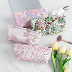 Floral embroidery canvas makeup bags with zip closure and elegant botanical patterns