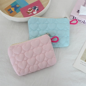 Quilted heart coin pouch in pink and blue colors with portable rope handle