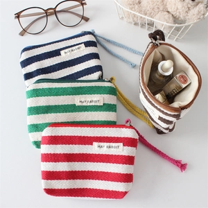 Minimalist striped canvas coin purse with zipper and colorful cotton rope hook