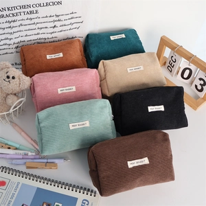 Multi-color corduroy pouches display for stationery or cosmetics storage with soft texture