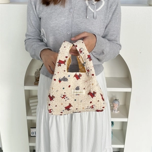 Chic bubble texture handbag with cute dog prints and branded label for daily commute