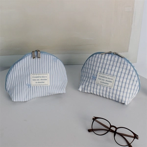 Light blue embroidered shell makeup bag set with stripes and plaid patterns