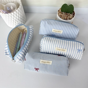 Fresh light blue striped pencil case with large capacity and cute bow embroidery detail