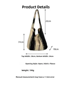 Detailed dimension guide for black and white fleece tote bag showing size and capacity