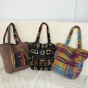 Detail showing plush tote bags in brown nylon, tribal pattern, and colorful plaid texture