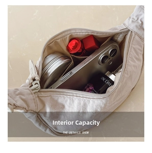 Interior view of the water-resistant crescent bag showing ample space for daily essentials