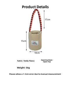 Macro view of beige plush teddy fleece bag dimensions and plaid handle details