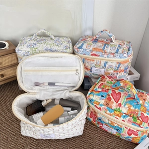 Trousse de toilette matelassée en coton avec motifs floraux et poche intérieure